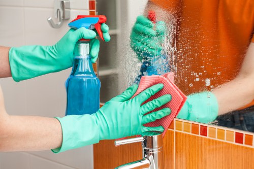 Professional steam carpet cleaning equipment removing dirt from carpet fibers