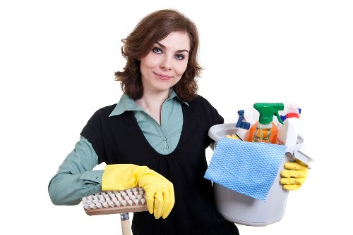 Technician performing deep carpet cleaning in a commercial space